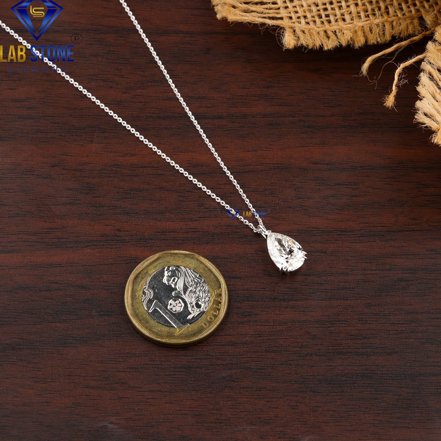 0.03 TDW Pear Cut Diamond Solitaire Pendant with Chain