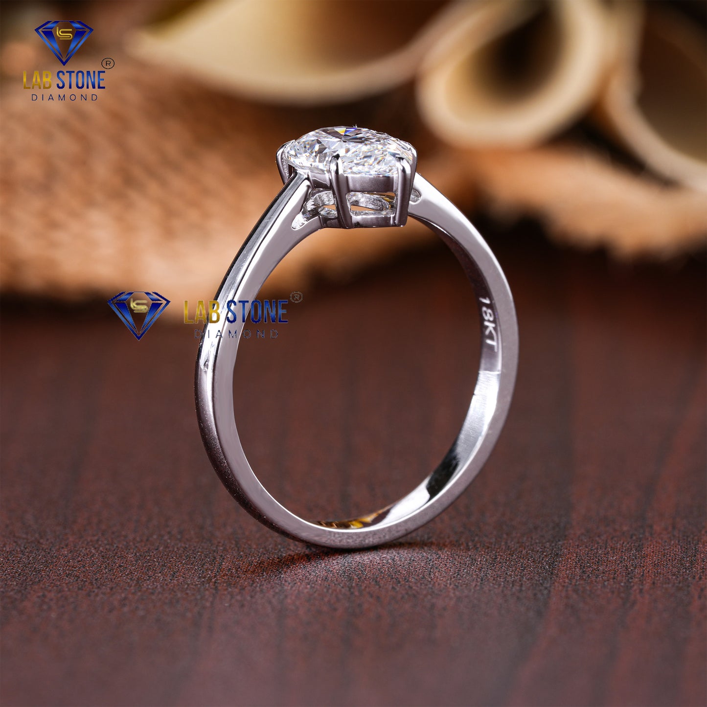 1.50 TDW Pear Cut Diamond Women’s Solitaire Ring