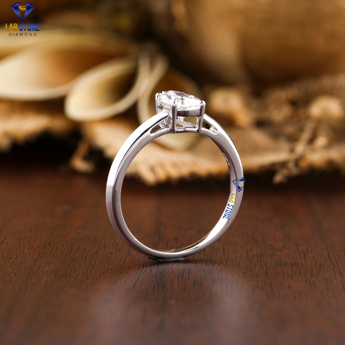 0.97 TDW Pear Cut Women’s Solitaire Diamond Ring