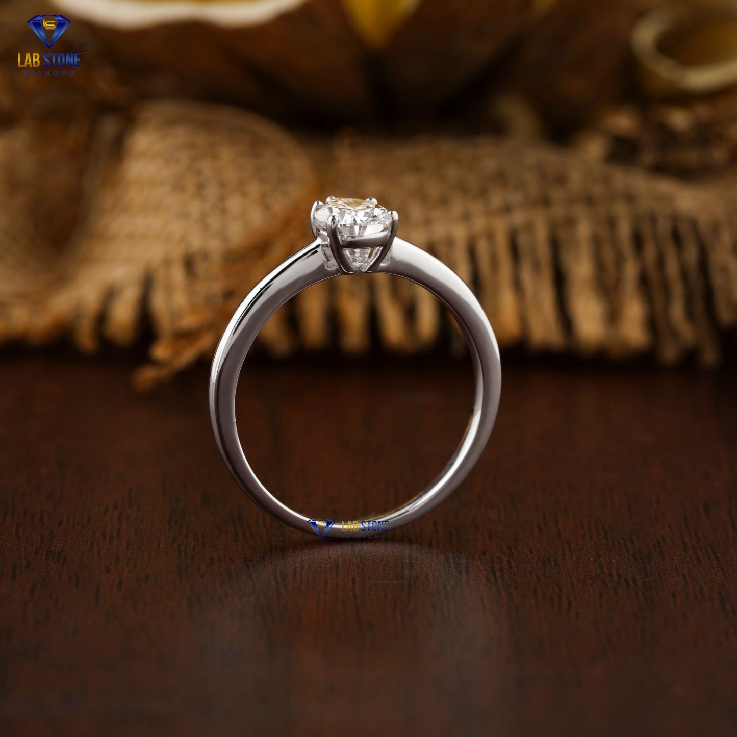 0.87 TDW Pear Cut Women’s Solitaire Diamond Ring