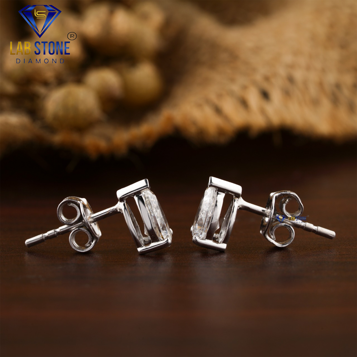 0.90 TDW Pear Cut Diamond Solitaire Stud Earring