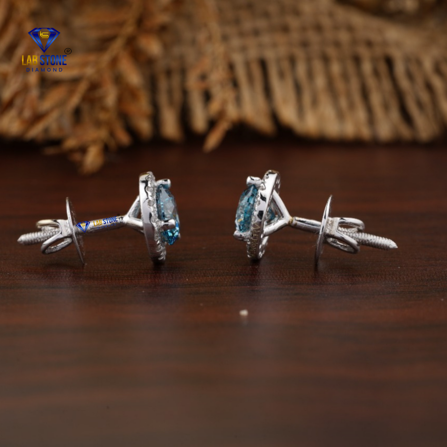 1.32 TDW Blue Round & Round Cut Diamond Stud Earrings