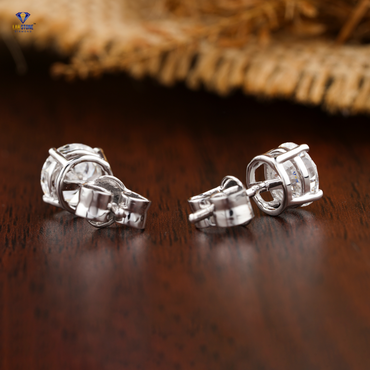 0.60 TDW Round Cut Diamond Solitaire Stud Earring
