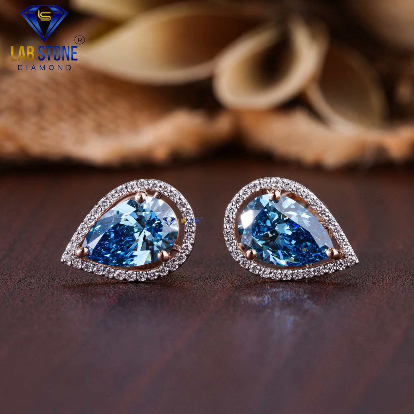 4.31 TDW Fancy Blue Pear & Round Cut Diamond Stud Earring