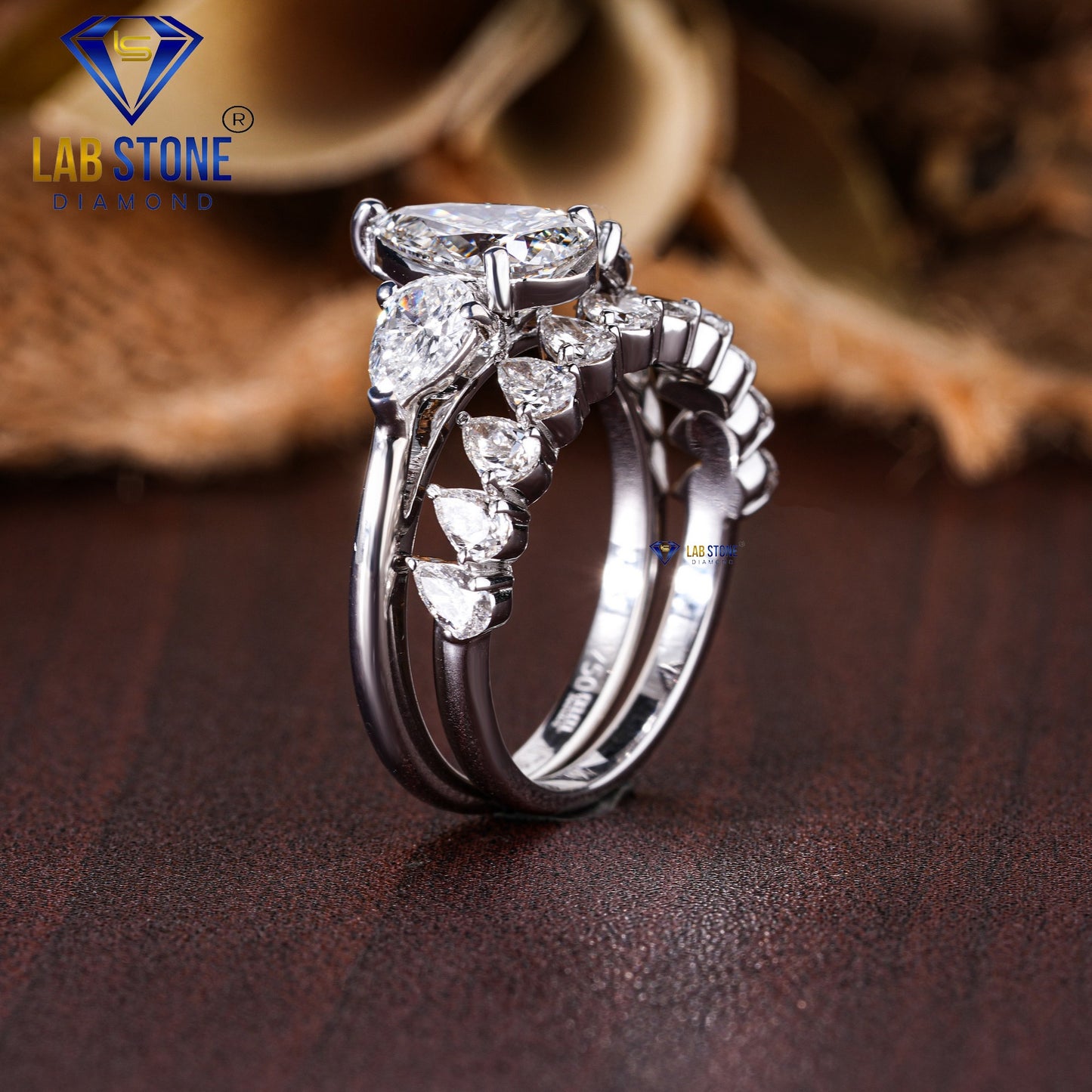 2.58 TDW Pear Cut Women’s Three Stone Diamond Ring with Pear Cut Diamond Band