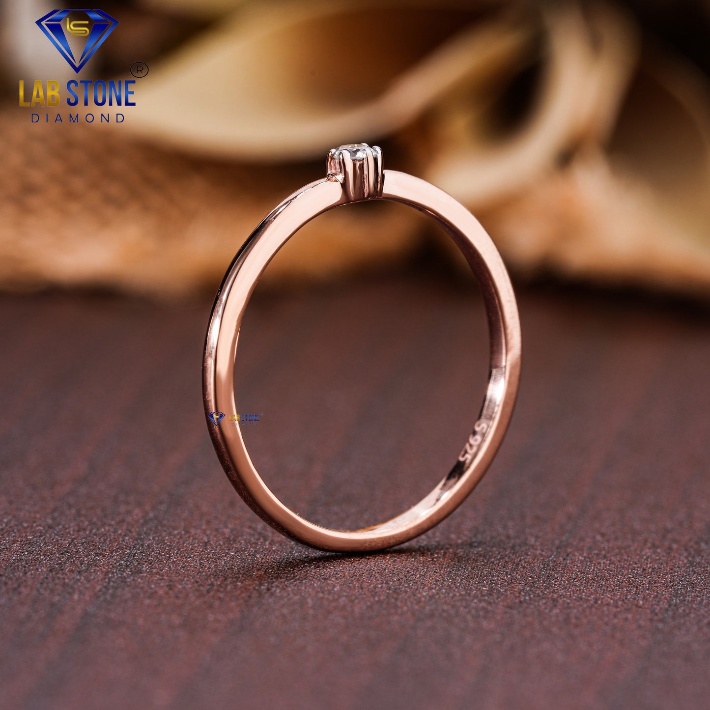 0.05 TDW Round Cut Diamond Women’s Solitaire Ring