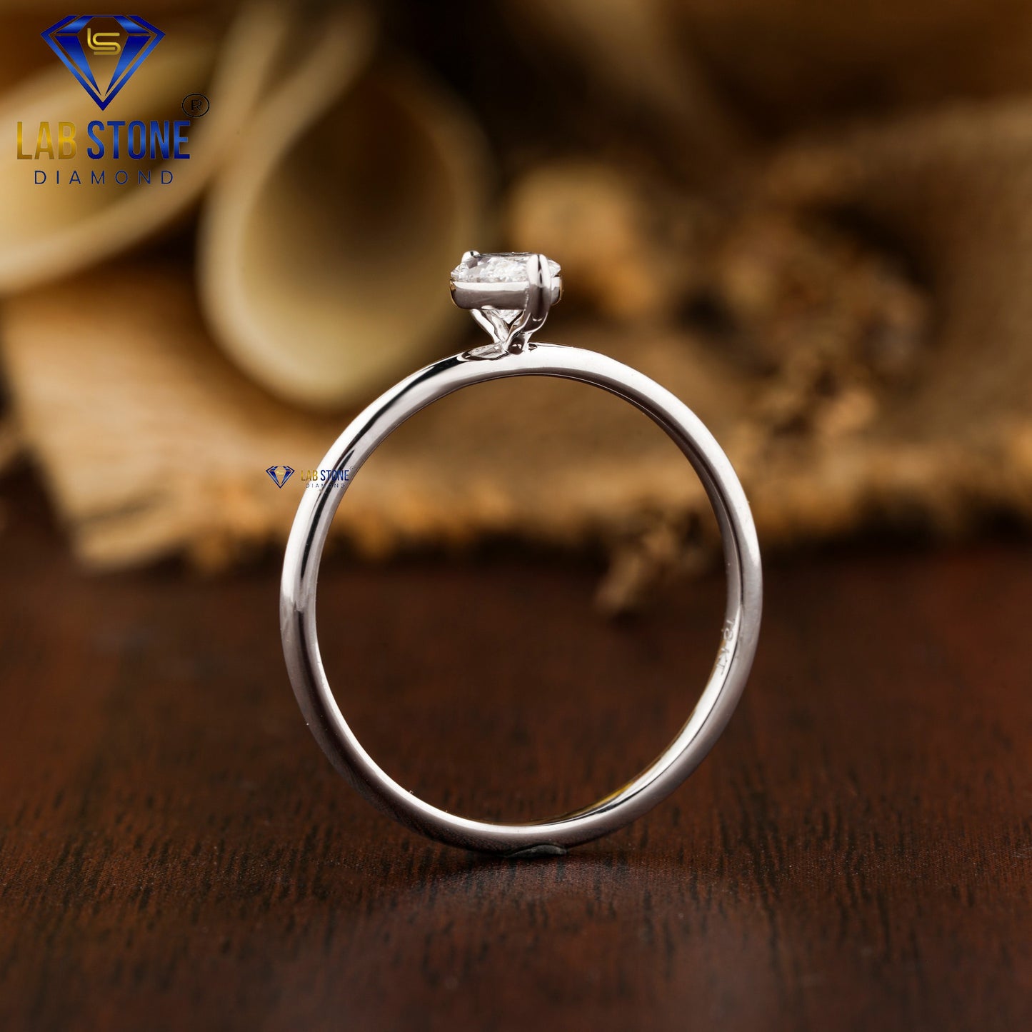 0.30 TDW Marquise Cut Women’s Solitaire Diamond Ring