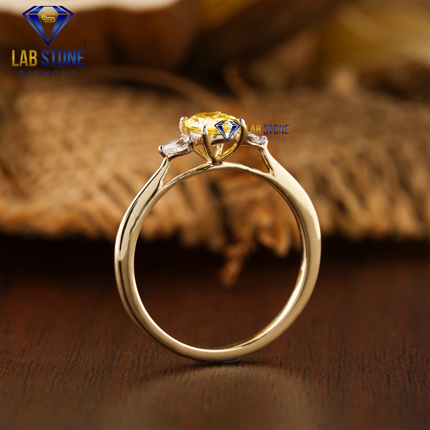 0.78 TDW Fancy Yellow Oval & Pear Cut Diamond Women’s Three Stone Ring