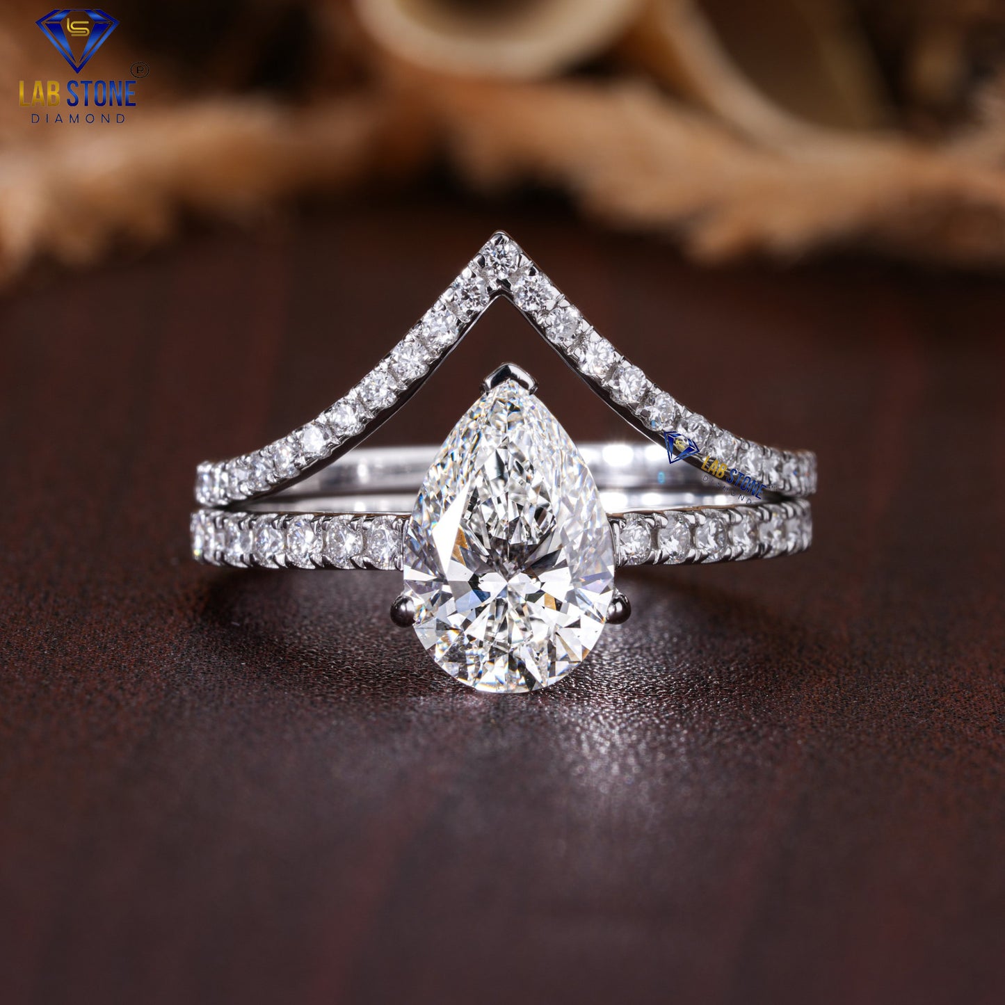 2.22 TDW Pear & Round Cut Women’s Diamond Ring with Band