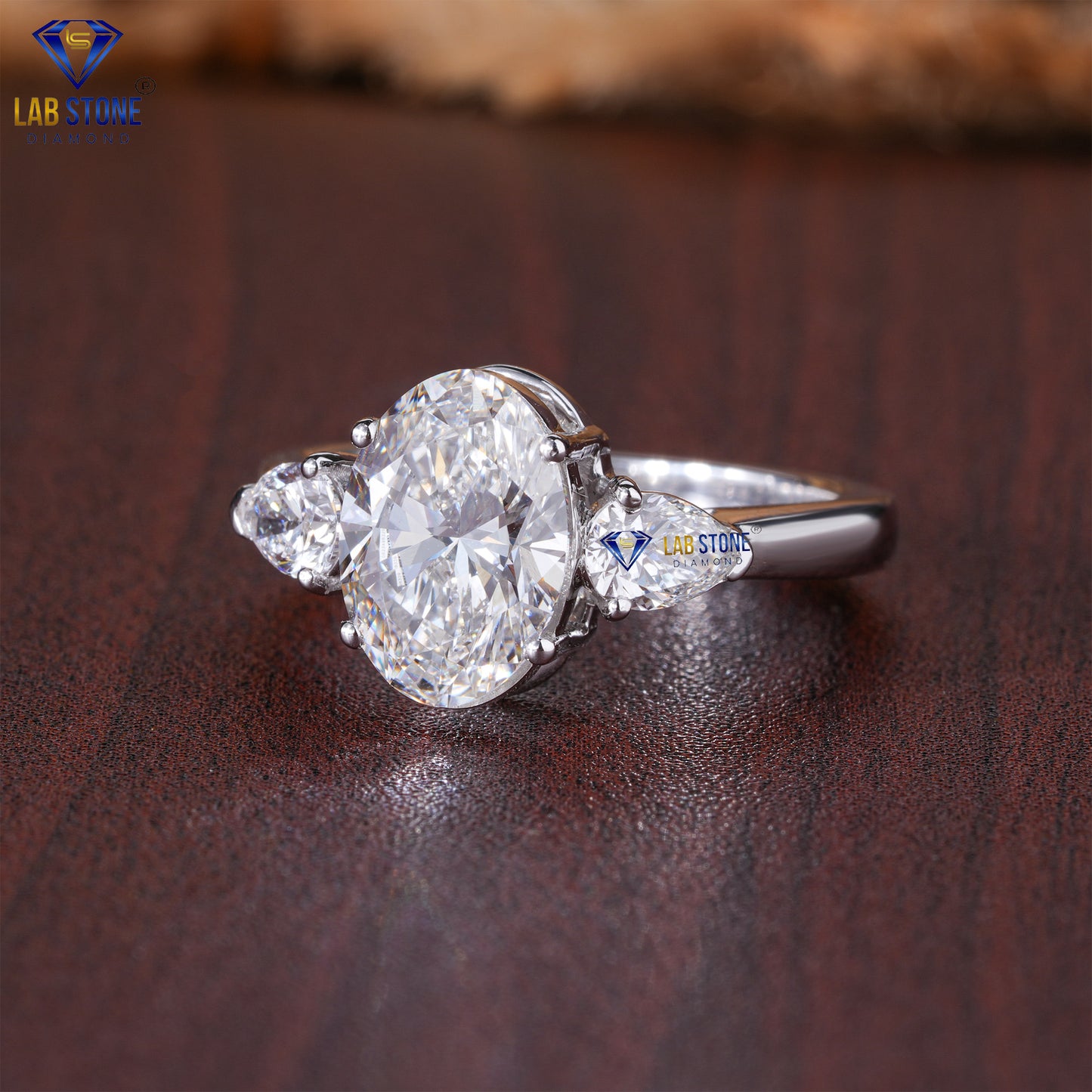 2.50 TDW Oval & Pear Cut Diamond Women's Three Stone Ring