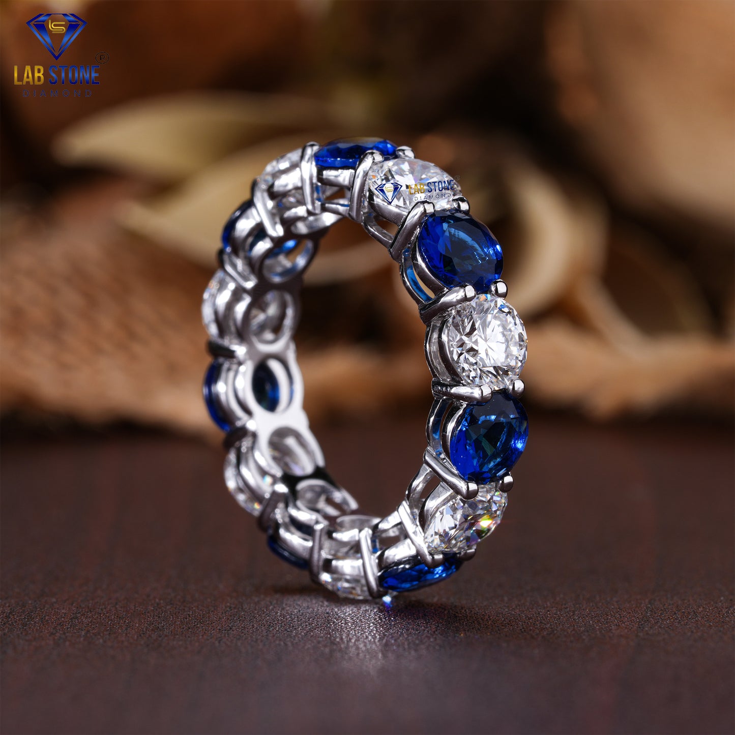 6.72 TDW Round Cut Diamond & Blue Round Gemstone Women’s Eternity Band