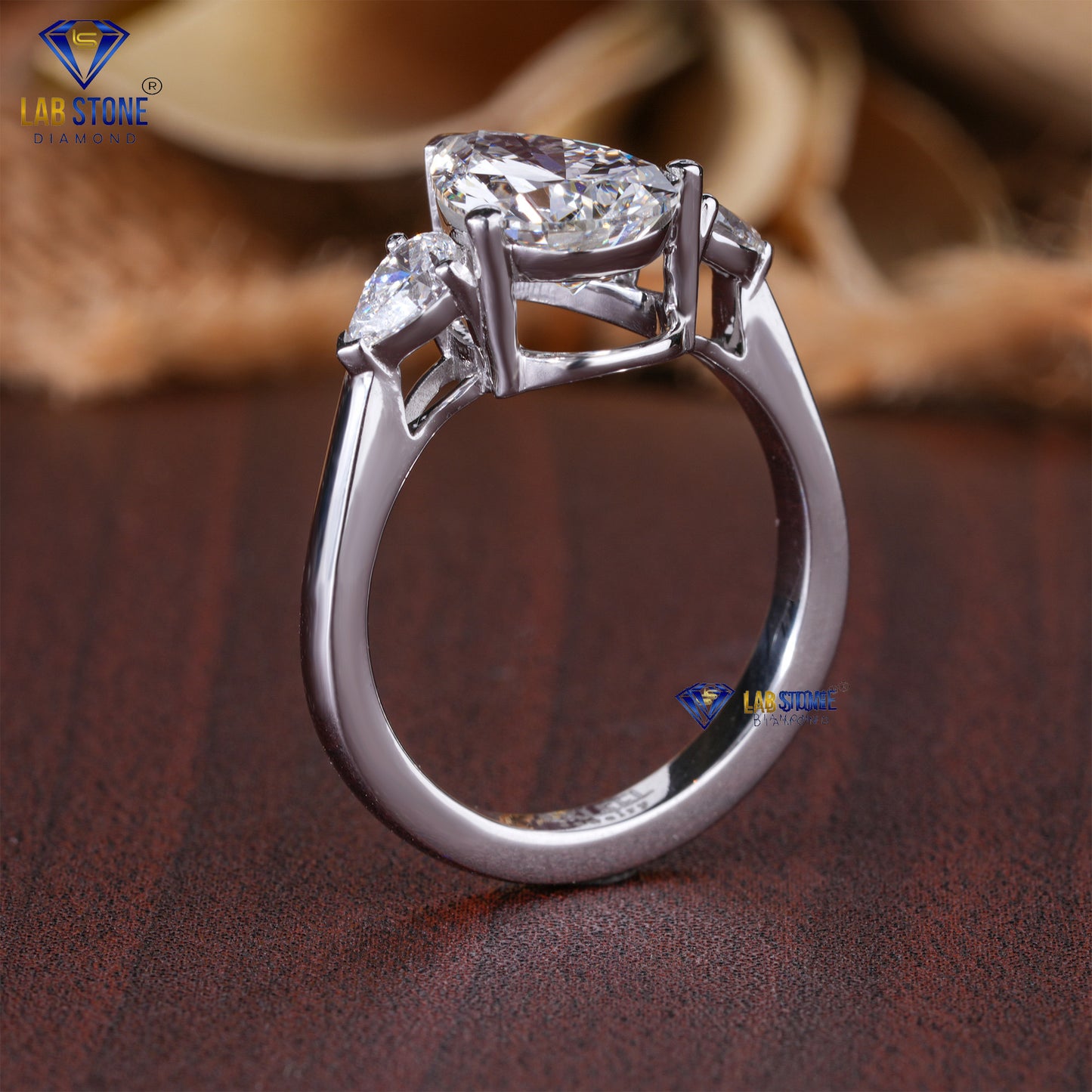 3.67 TDW Pear Cut Diamond Women's Three Stone Ring