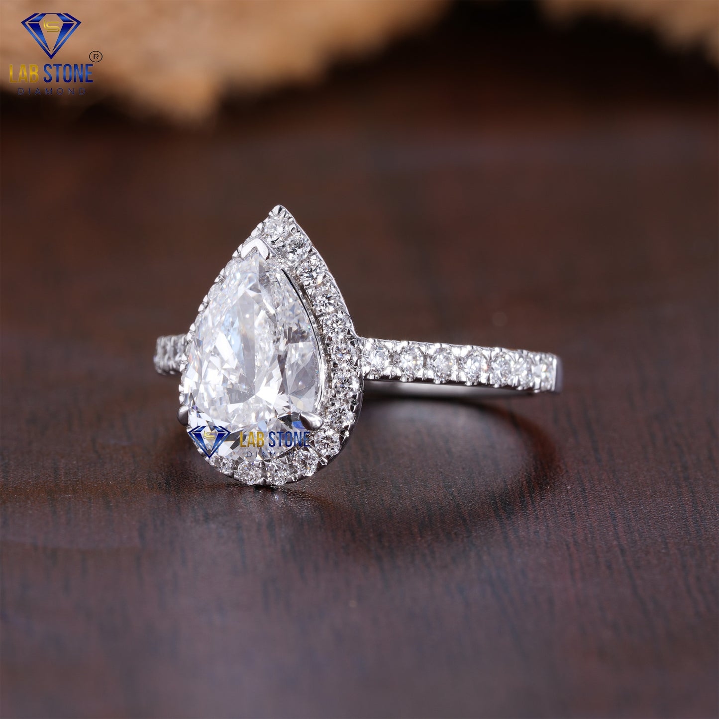 2.75 TDW Round & Pear Cut Women’s Halo Diamond Ring