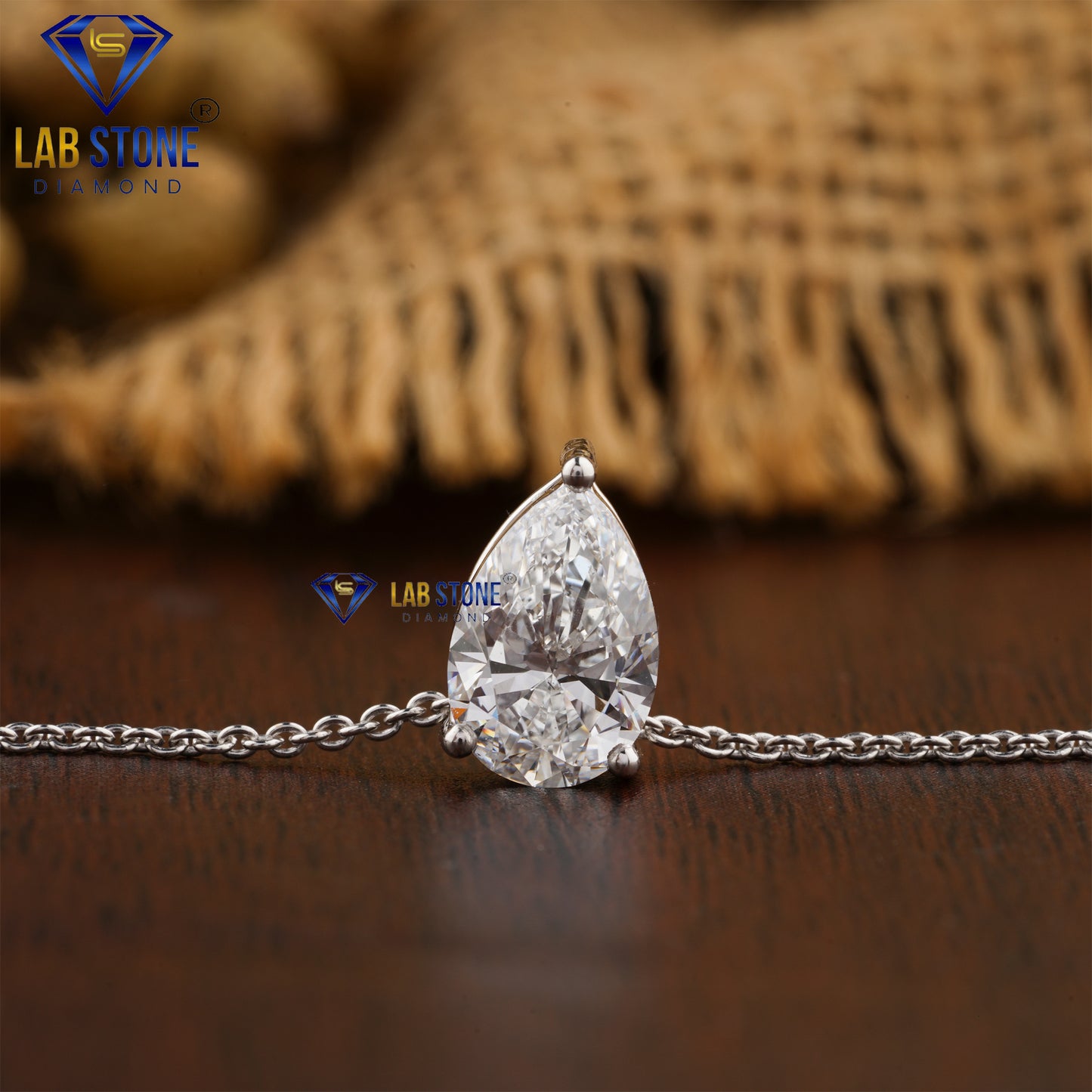 1.05 TDW Pear Cut Diamond Solitaire Pendant with Chain