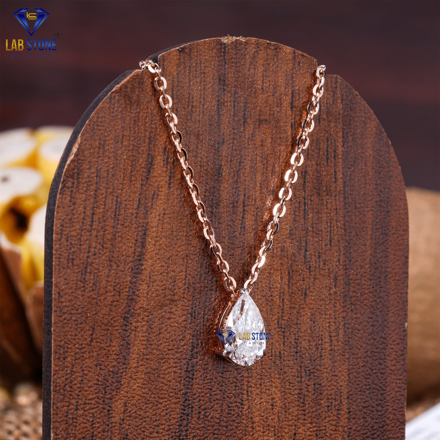 1.09 TDW Pear Cut Diamond Solitaire Pendant with Chain