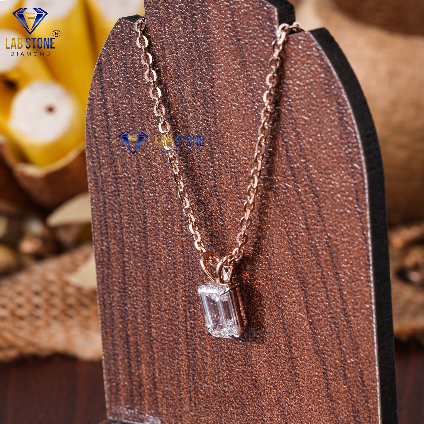 1.30 TDW Emerald Cut Diamond Solitaire Pendant with Chain