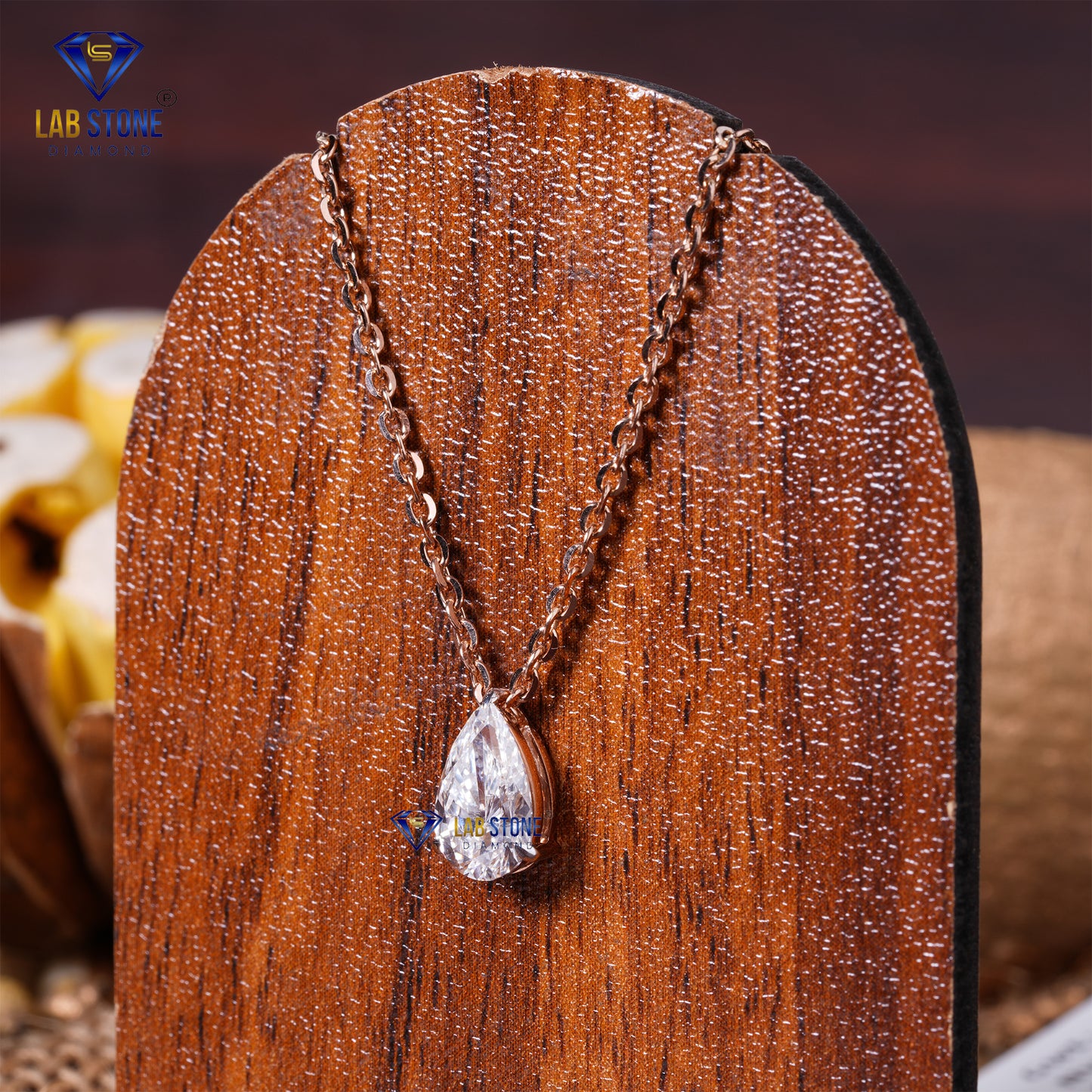 1.09 TDW Pear Cut Diamond Solitaire Pendant with Chain