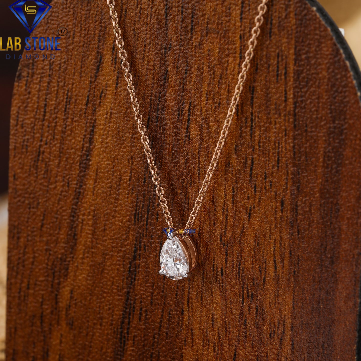 0.32 TDW Pear Cut Diamond Solitaire Pendant with Chain