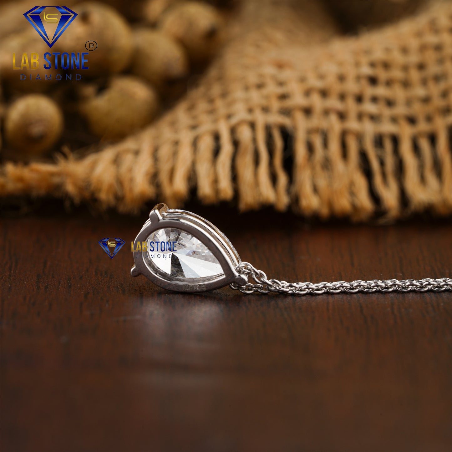 1.05 TDW Pear Cut Diamond Solitaire Pendant with Chain