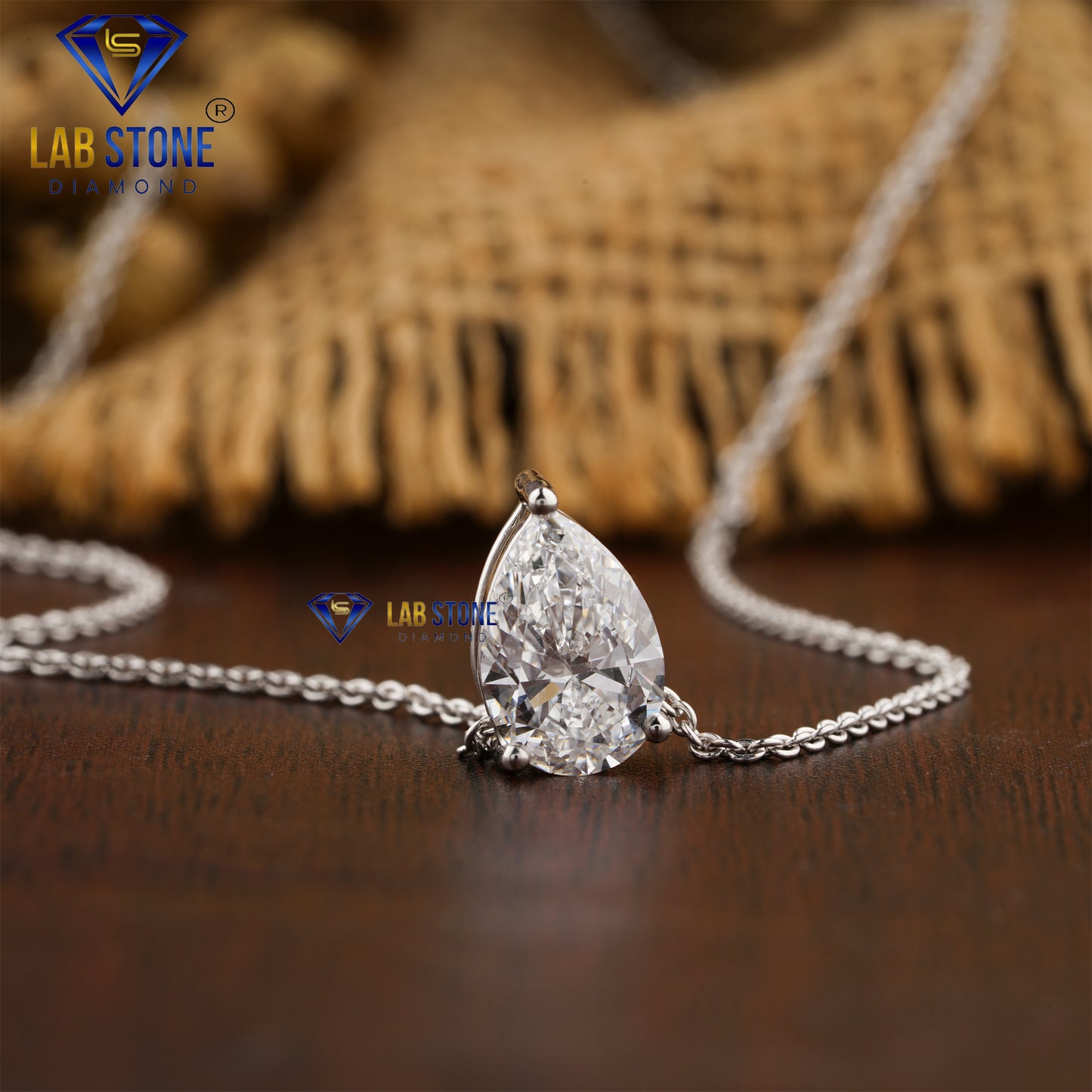 1.05 TDW Pear Cut Diamond Solitaire Pendant with Chain