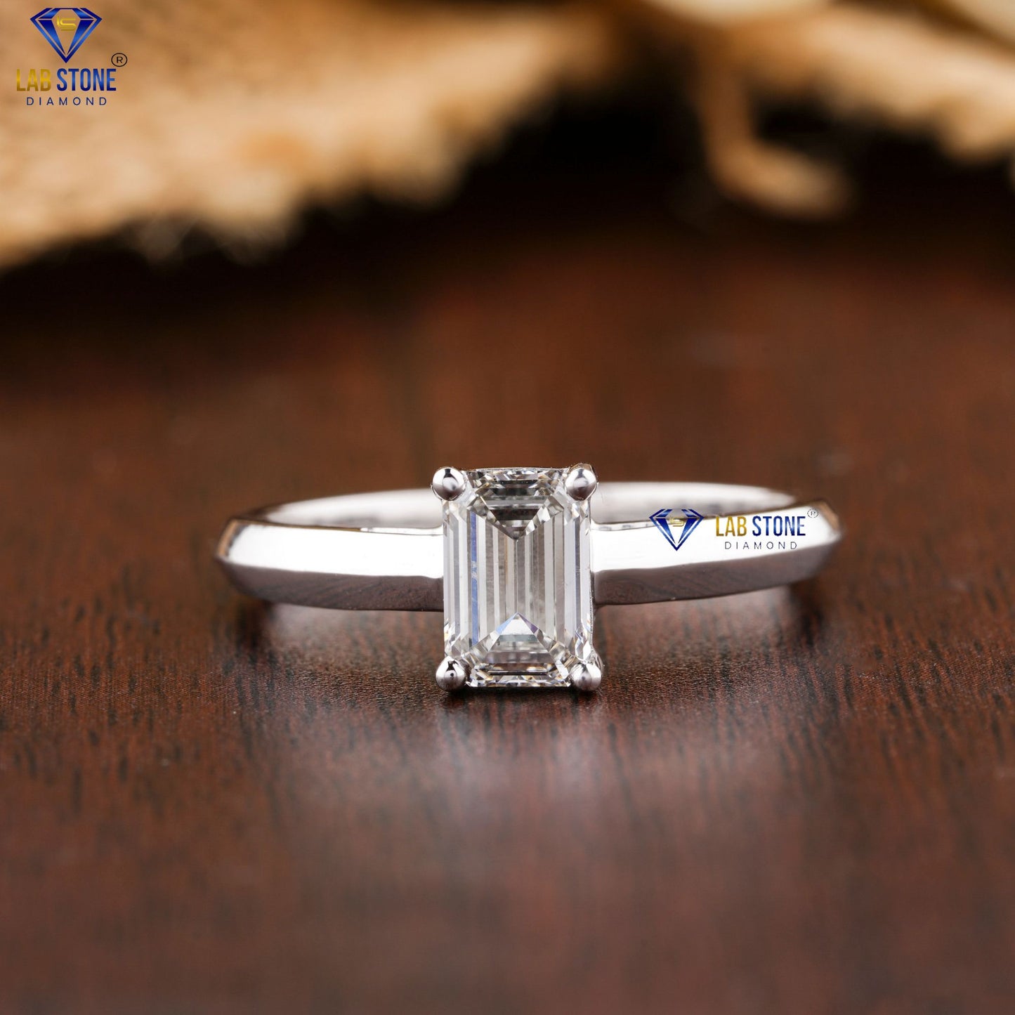 0.85 TDW Emerald Cut Women’s Solitaire Diamond Ring