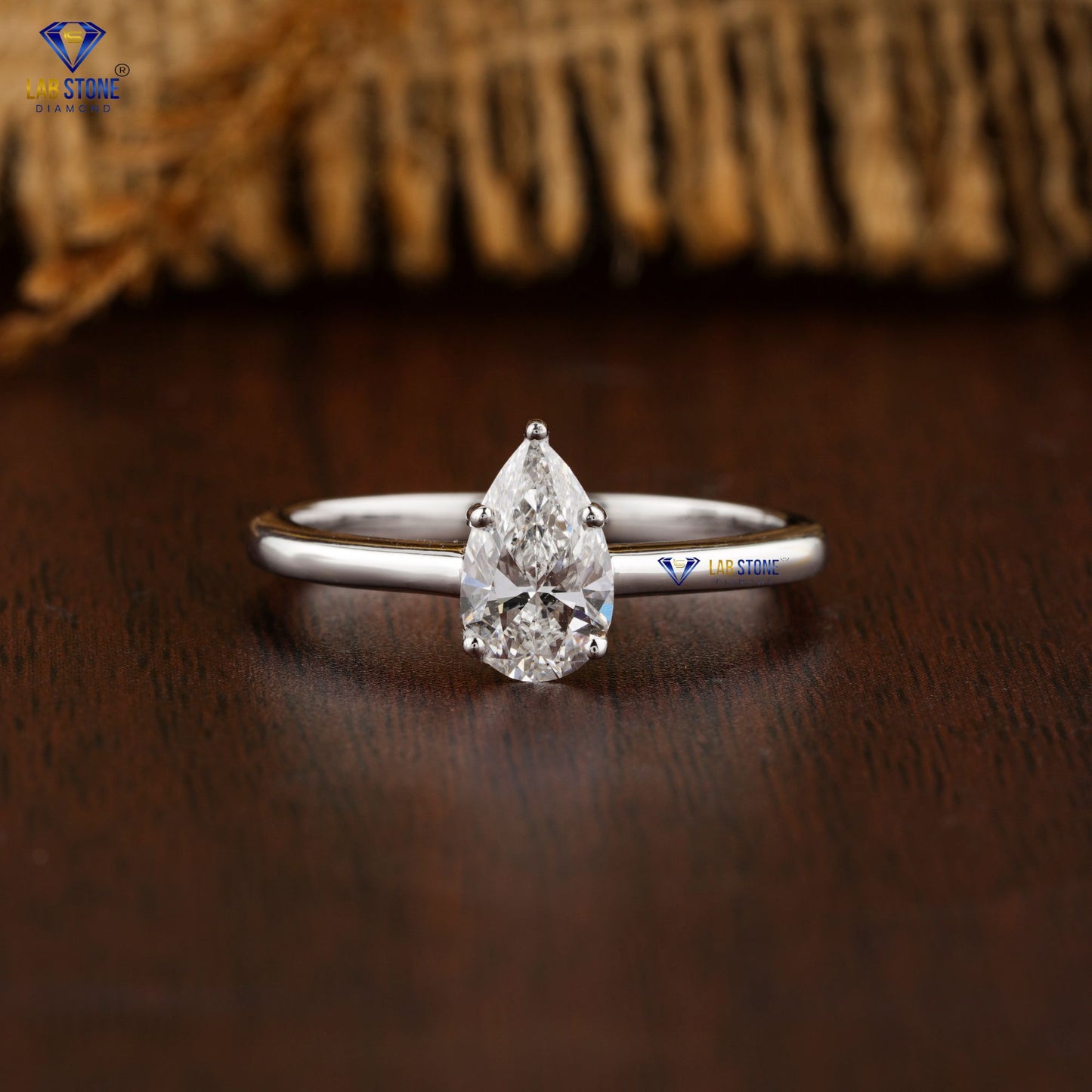 0.87 TDW Pear Cut Women’s Solitaire Diamond Ring