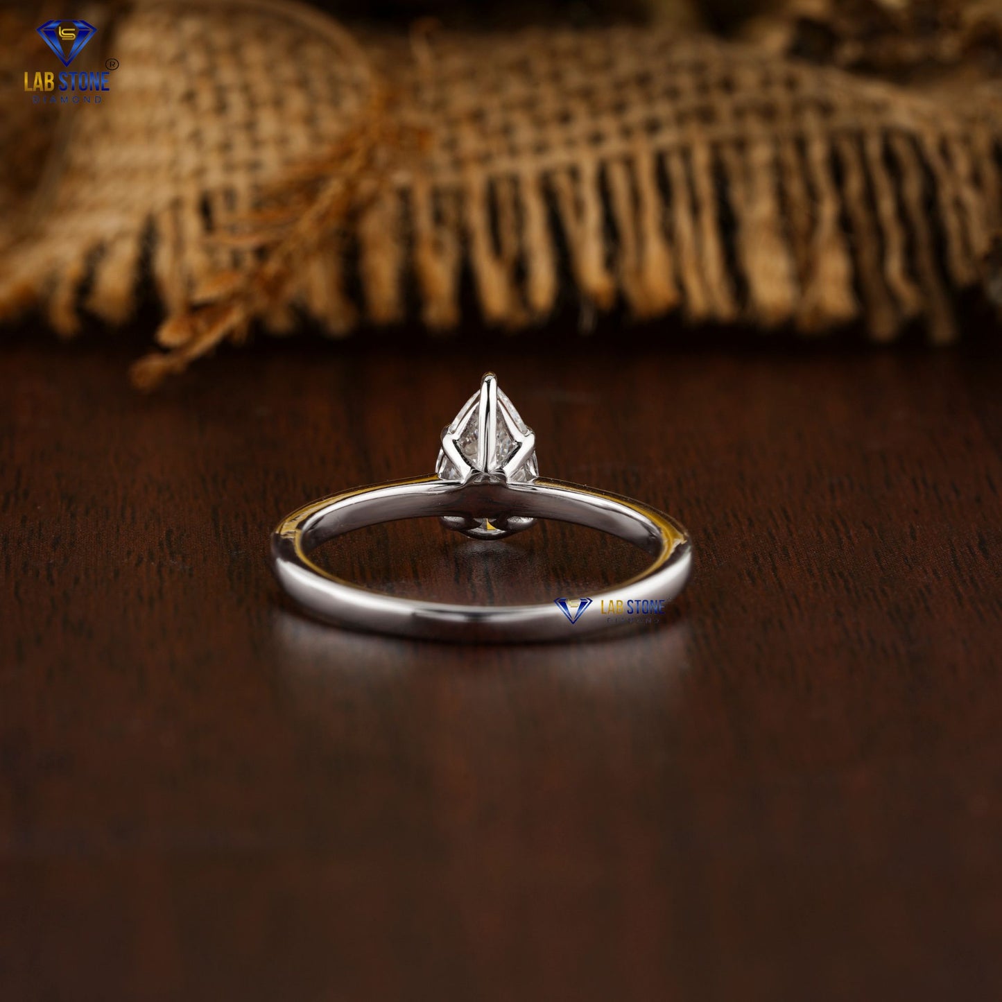 0.87 TDW Pear Cut Women’s Solitaire Diamond Ring