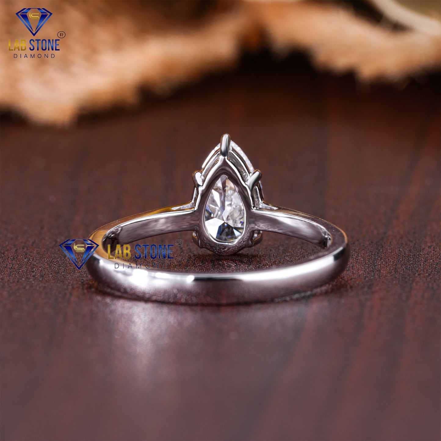 1.50 TDW Pear Cut Diamond Women’s Solitaire Ring