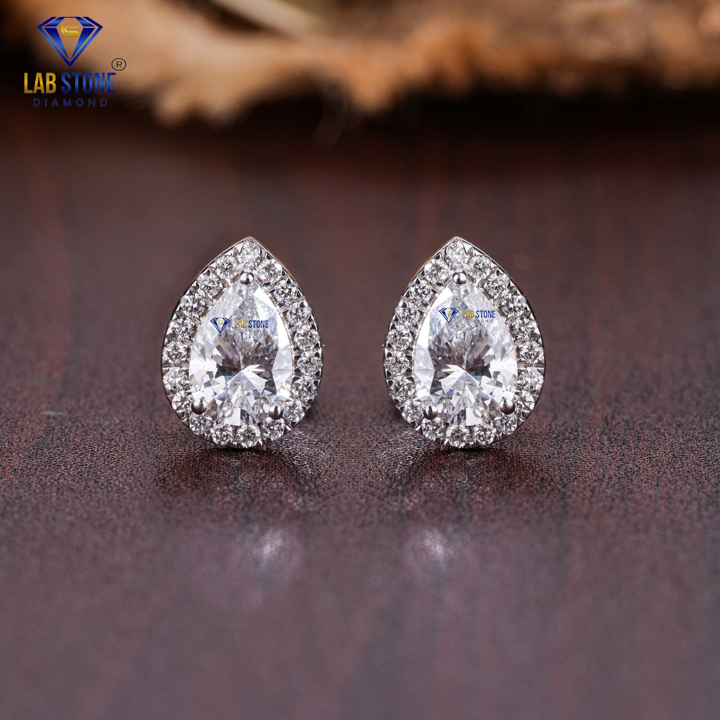 1.55 TDW Pear & Round Cut Diamond Stud Earring
