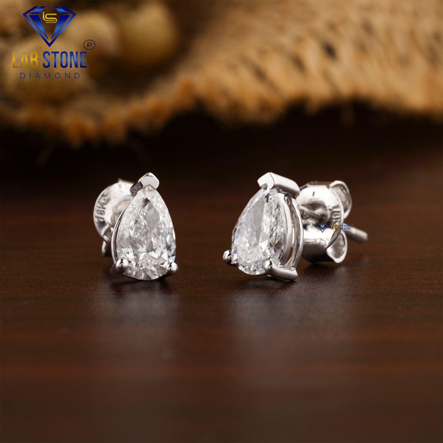 0.90 TDW Pear Cut Diamond Solitaire Stud Earring
