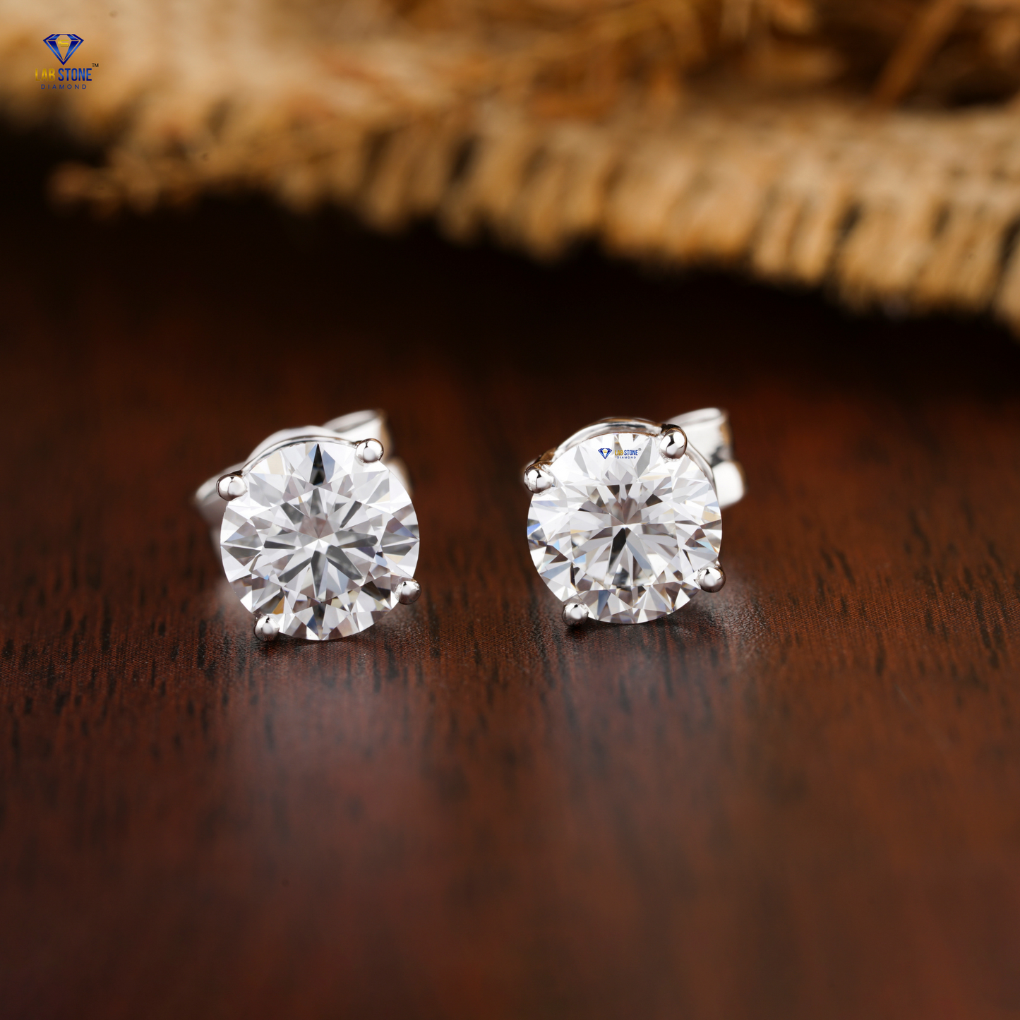 0.60 TDW Round Cut Diamond Solitaire Stud Earring