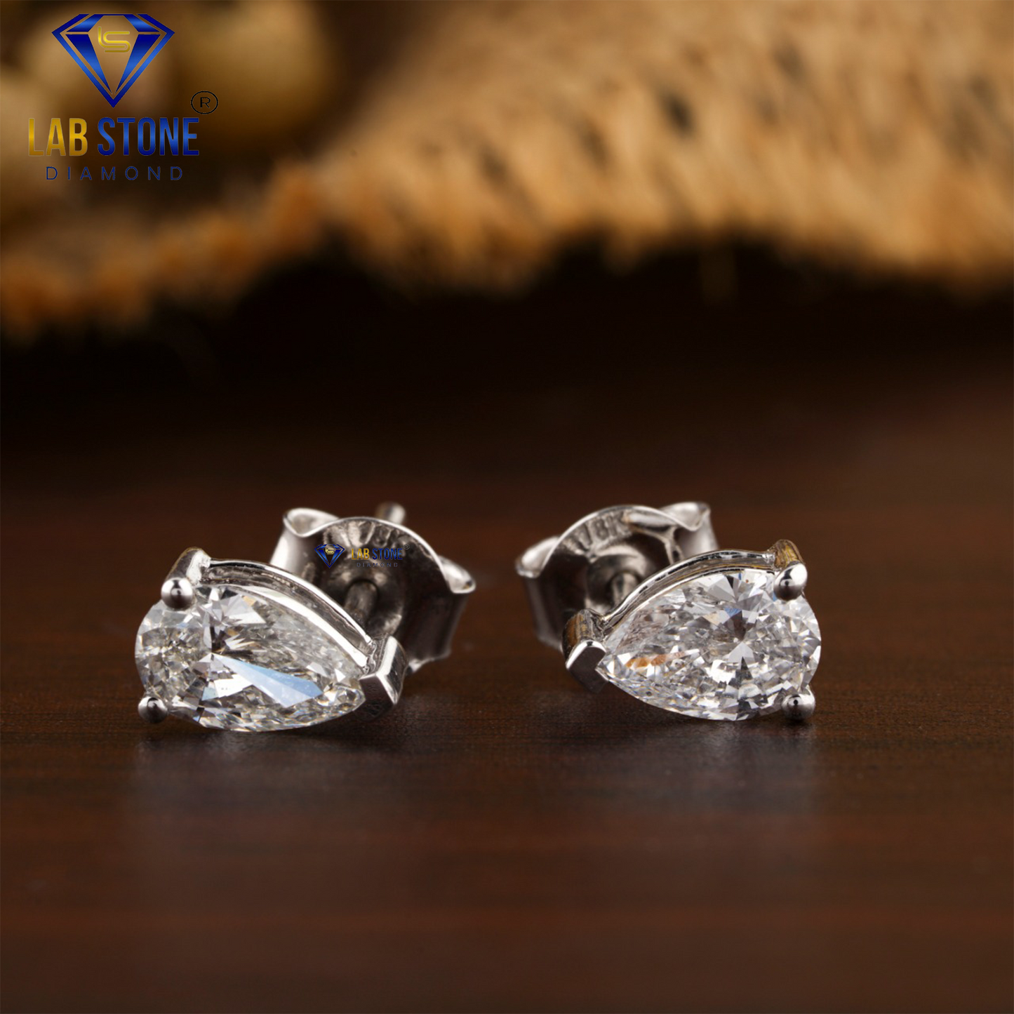 0.90 TDW Pear Cut Diamond Solitaire Stud Earring