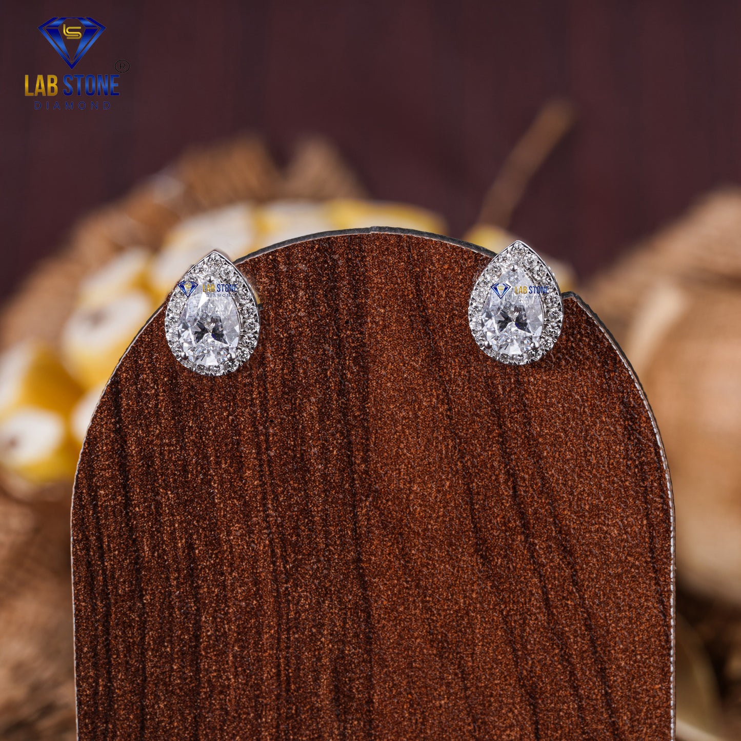 1.55 TDW Pear & Round Cut Diamond Stud Earring