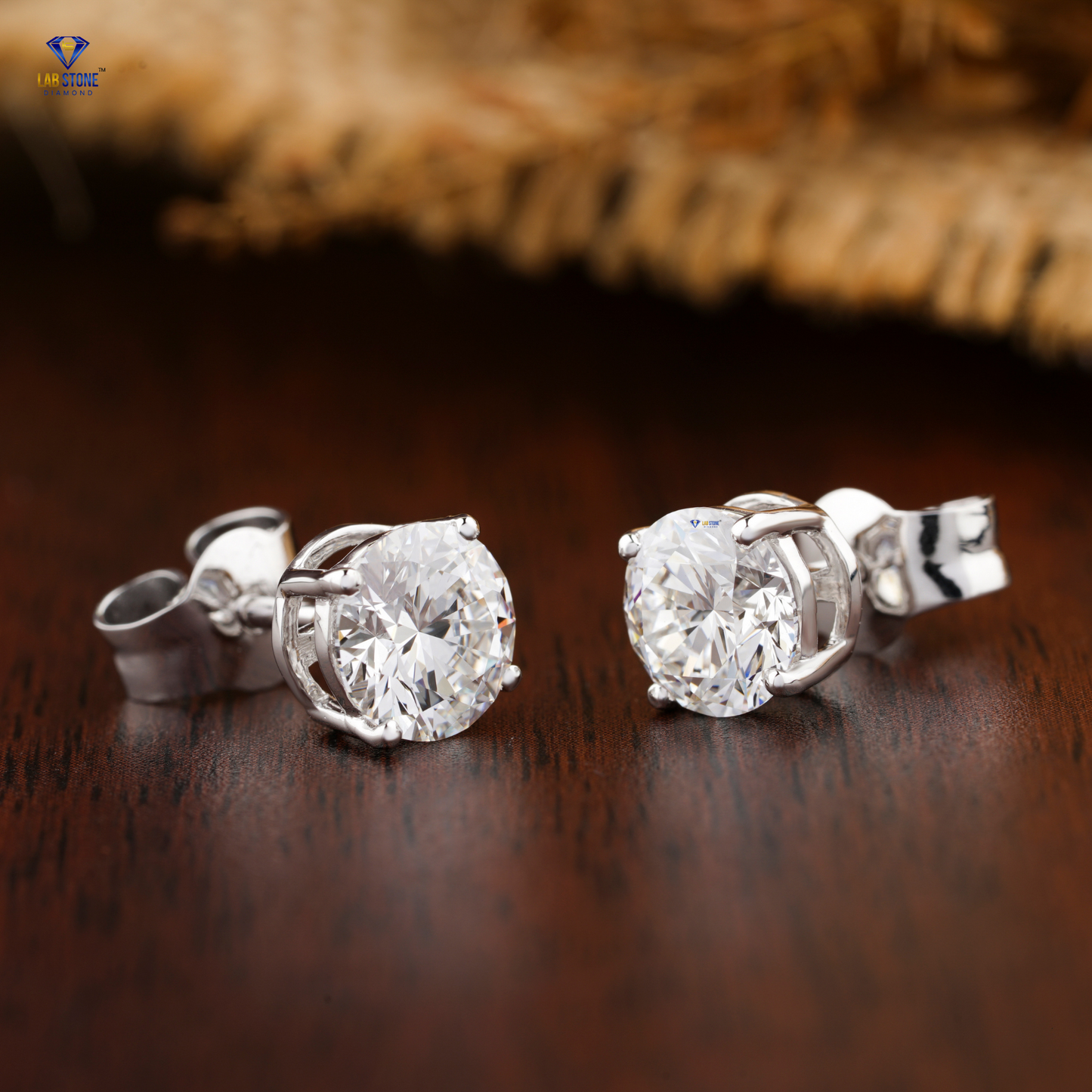 0.60 TDW Round Cut Diamond Solitaire Stud Earring