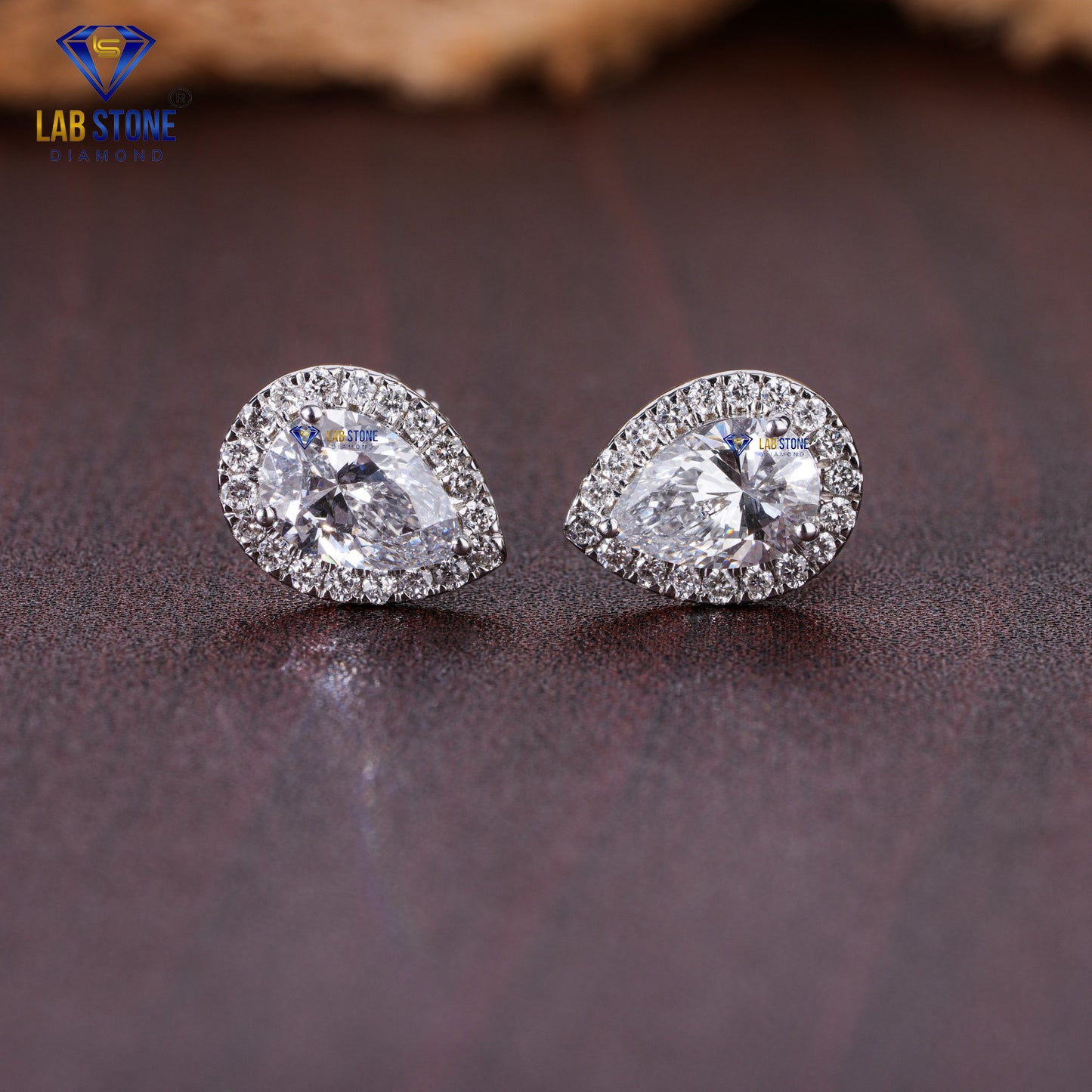 1.55 TDW Pear & Round Cut Diamond Stud Earring