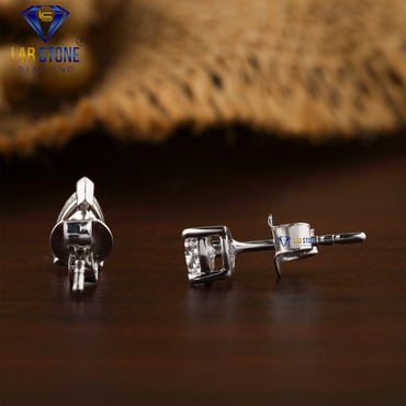 0.90 TDW Pear Cut Diamond Solitaire Stud Earring