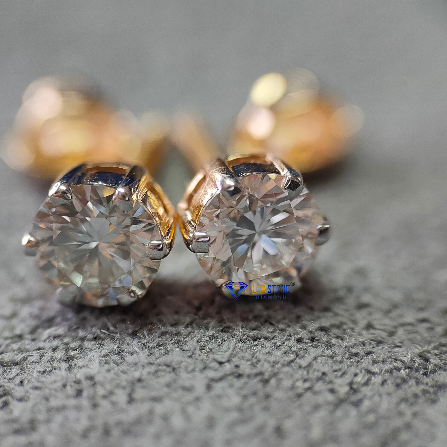 0.60 TDW Round Cut Diamond Stud Earrings