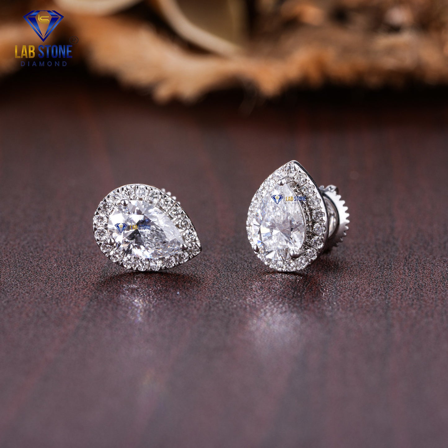 1.55 TDW Pear & Round Cut Diamond Stud Earring