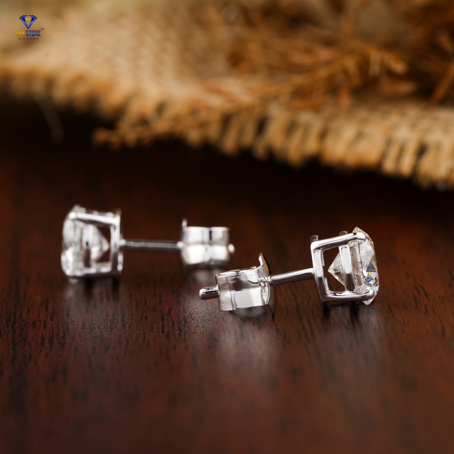 0.60 TDW Round Cut Diamond Solitaire Stud Earring