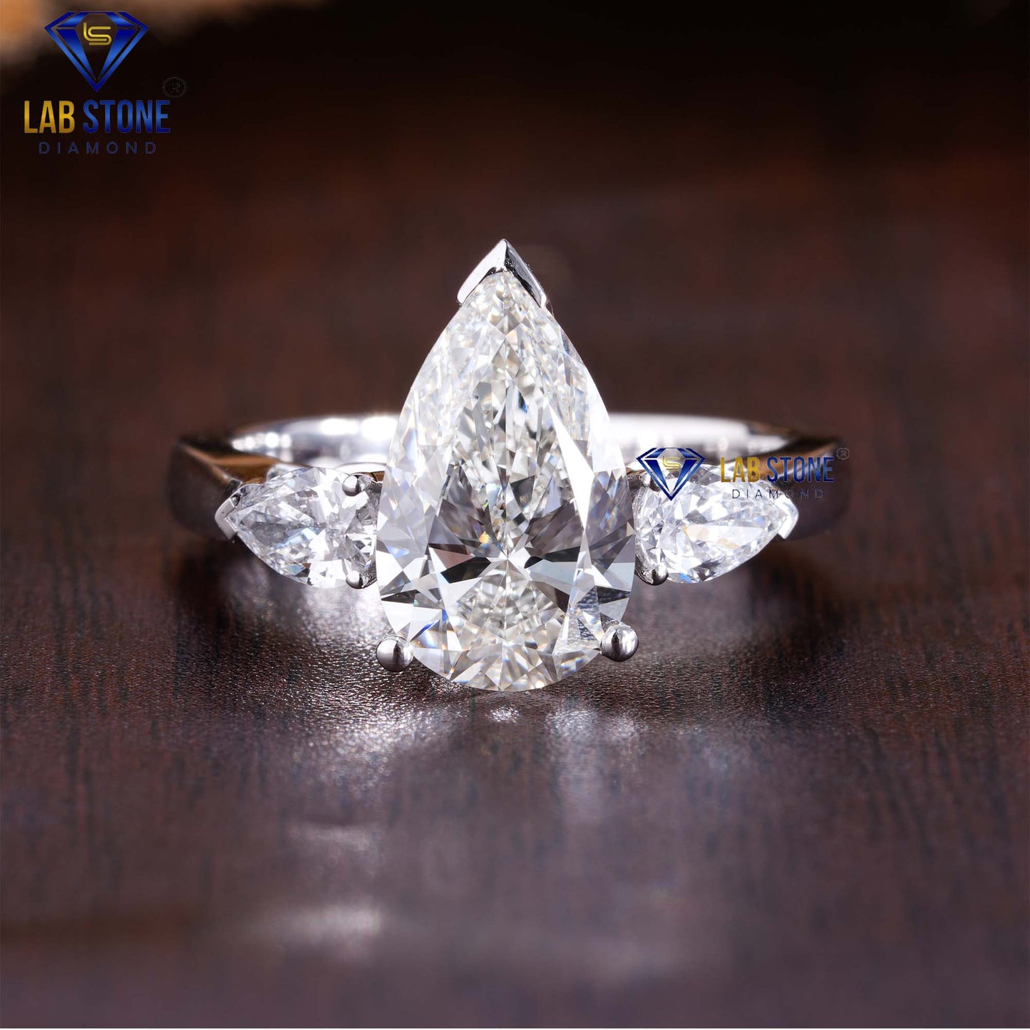 3.67 TDW Pear Cut Diamond Women’s Three Stone Ring
