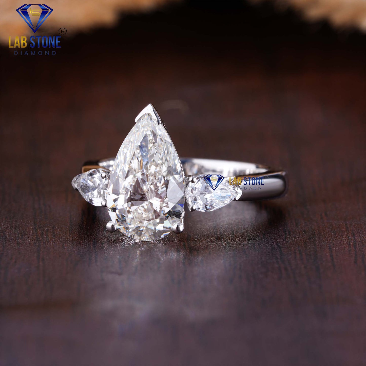 3.67 TDW Pear Cut Diamond Women’s Three Stone Ring