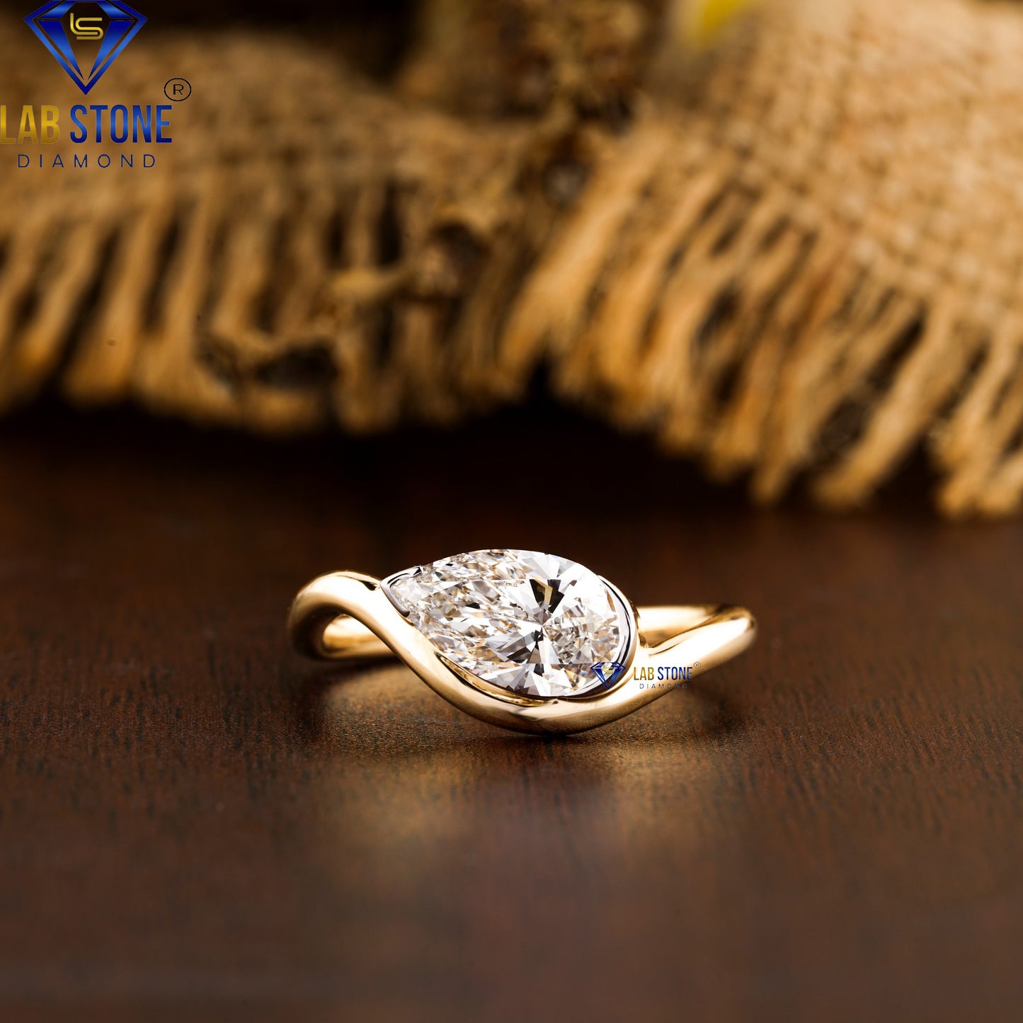 1.00 TDW Pear Cut Women’s Solitaire Diamond Ring