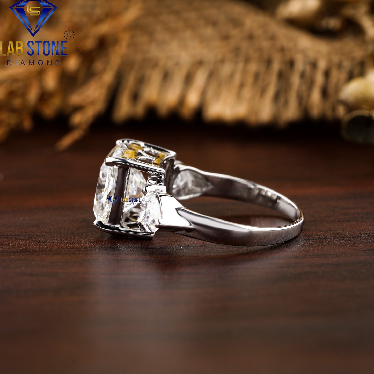5.55 TDW Cushion & Pear Cut Diamond Three-Stone Ring