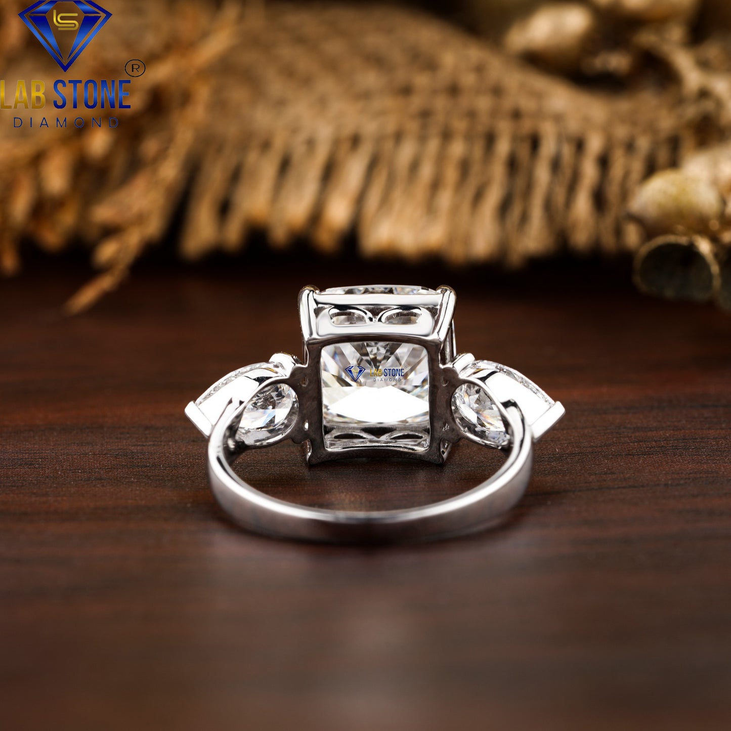 5.55 TDW Cushion & Pear Cut Diamond Three-Stone Ring