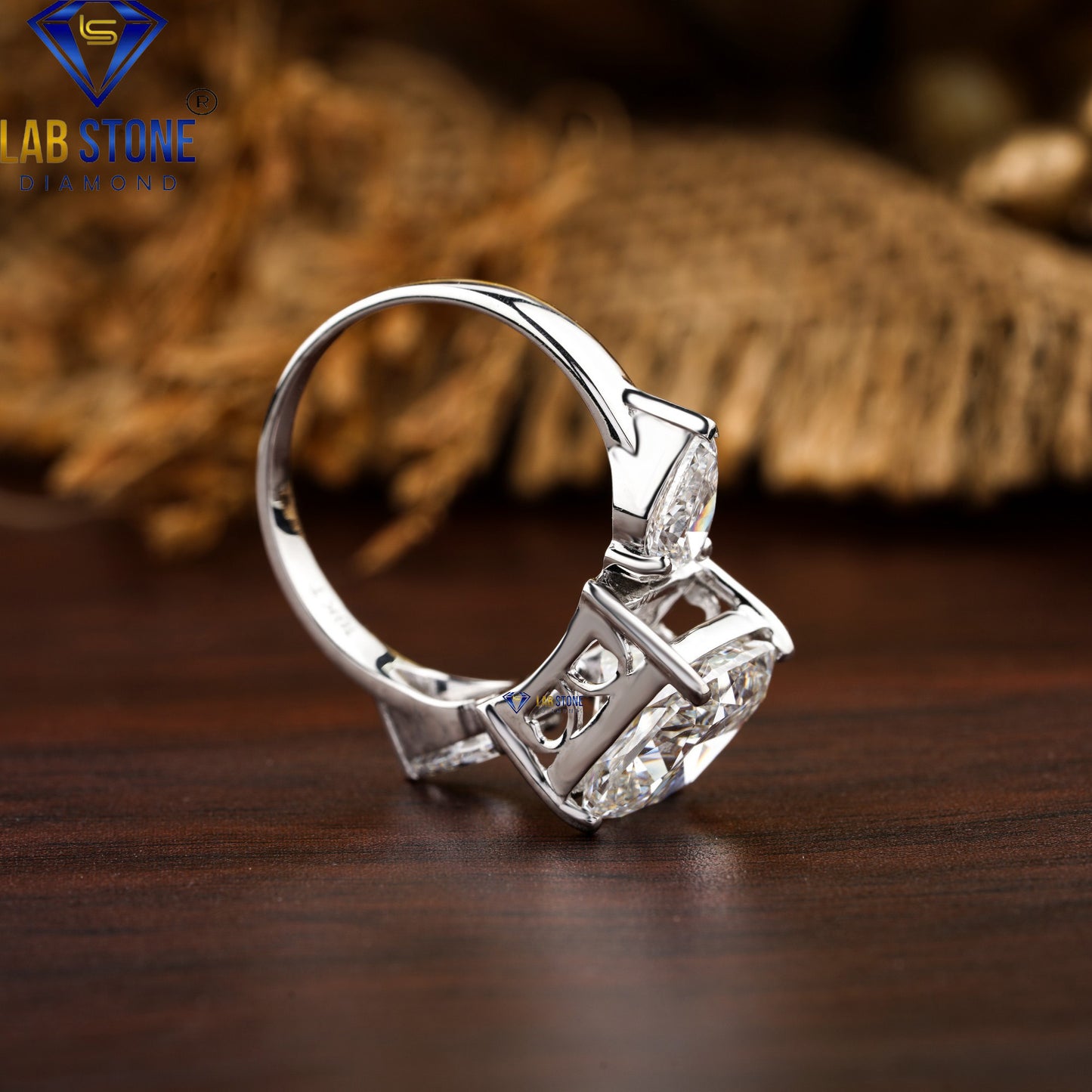 5.55 TDW Cushion & Pear Cut Diamond Three-Stone Ring