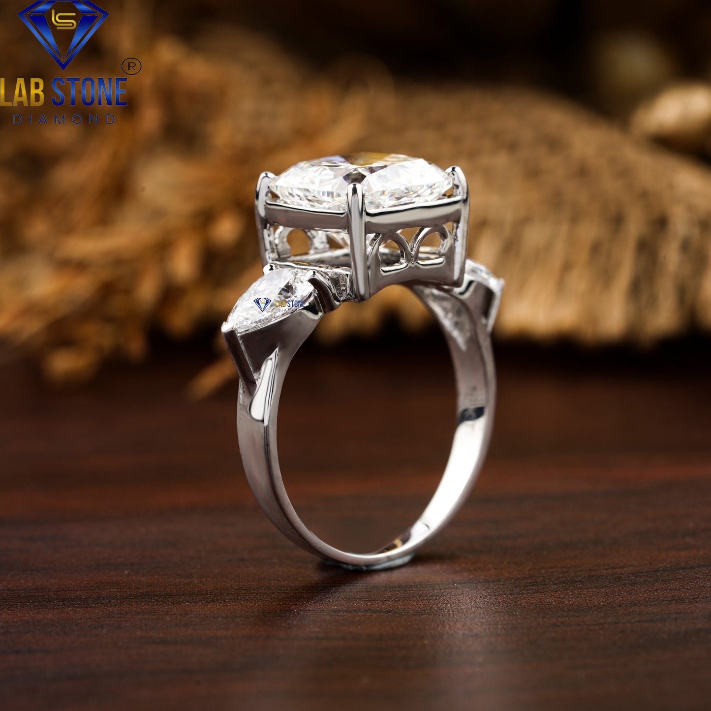 5.55 TDW Cushion & Pear Cut Diamond Three-Stone Ring
