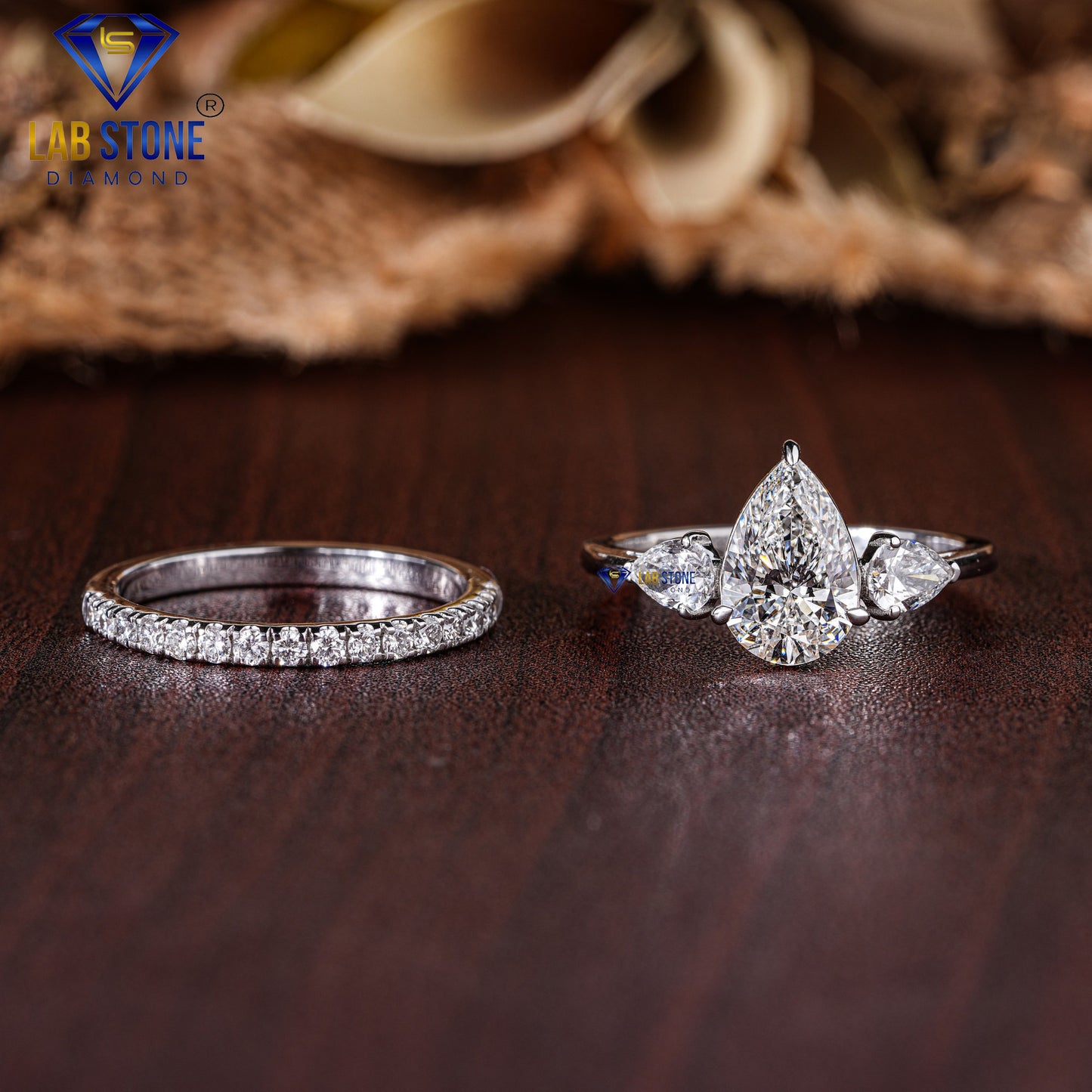 1.90 TDW Pear cut & Round cut Diamond three stone ring with band