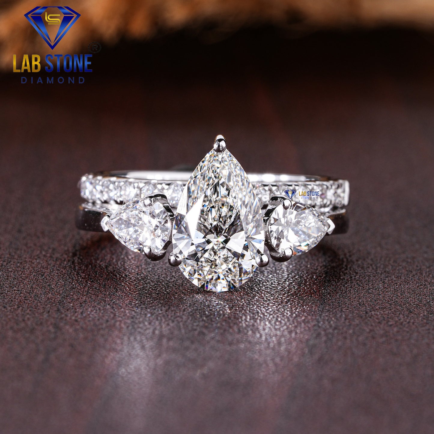 1.79 TDW Pear & Round Cut Women’s Three Stone Diamond Ring with Band