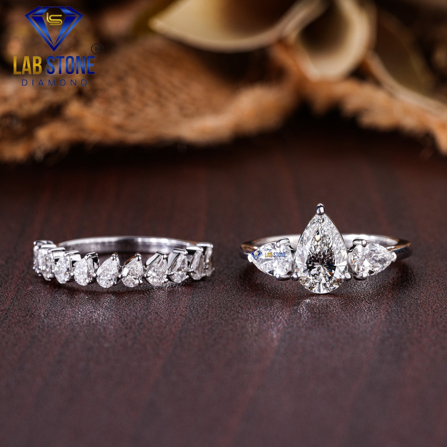 2.58 TDW Pear Cut Women’s Three Stone Diamond Ring with Pear Cut Diamond Band