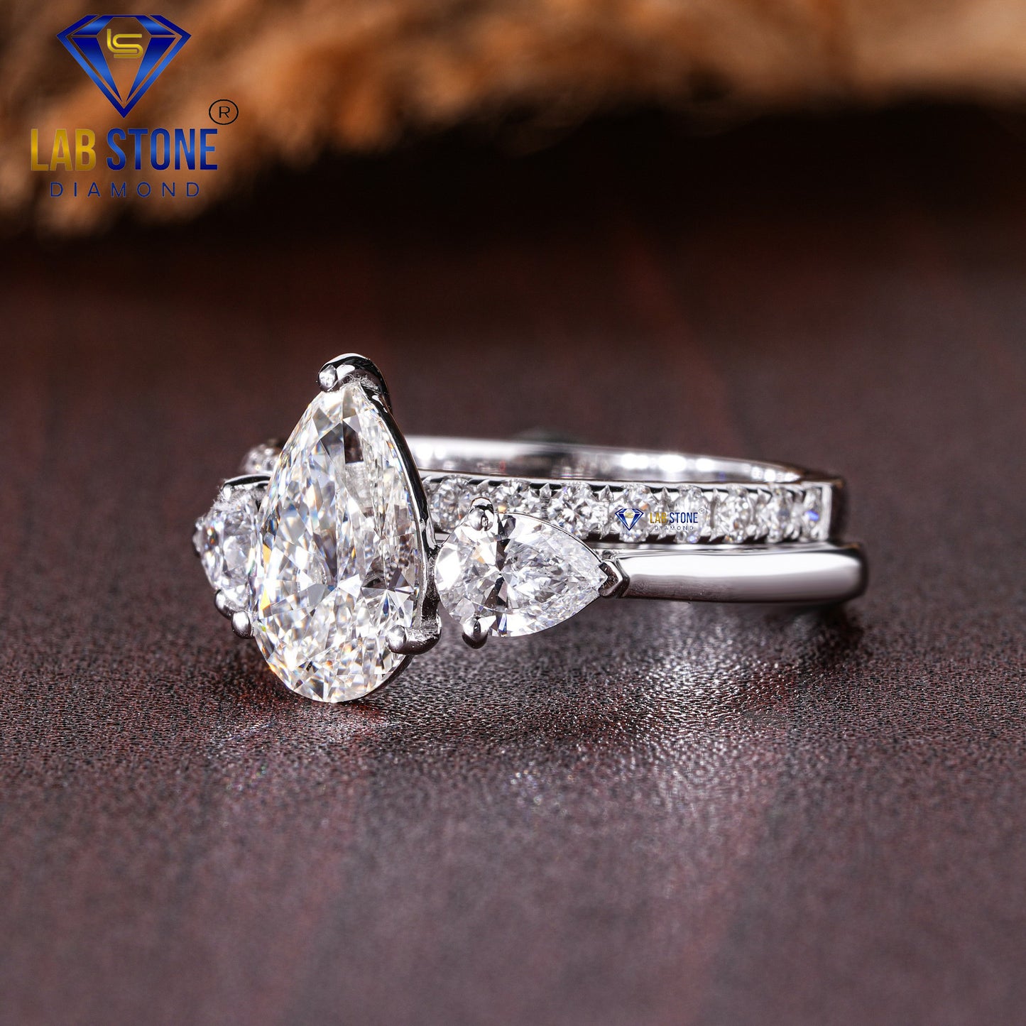 1.79 TDW Pear & Round Cut Women’s Three Stone Diamond Ring with Band